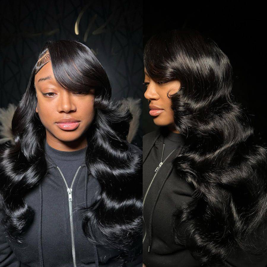 Model wearing a jet black HD lace frontal wig with body wave curls. The ultra-thin lace blends seamlessly for a realistic hairline.