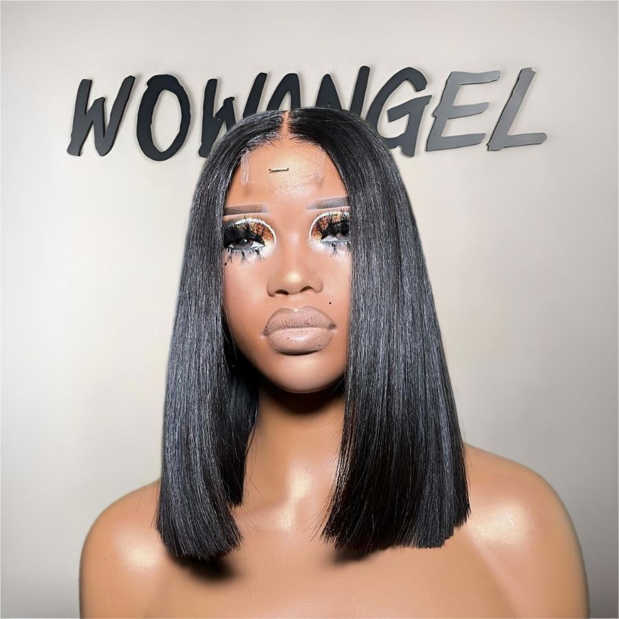 Person with a black straight bob wig in front of a gray background with 'WOWANGEL' text.