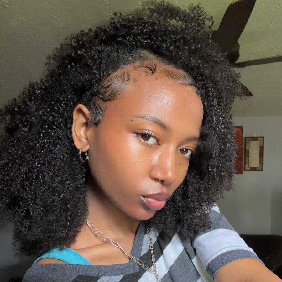 WOWANGEL Half Wig in kinky curly texture shown on model with sleek edges and natural blend, ideal for effortless styling.