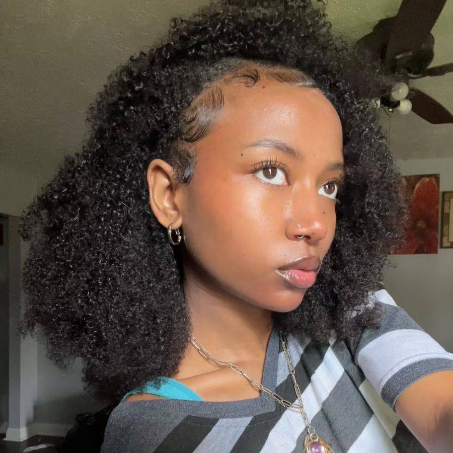 WOWANGEL Kinky Curly Seamless Half Wig styled with natural edges and volume, offering a secure, beginner-friendly hair accessory option.
