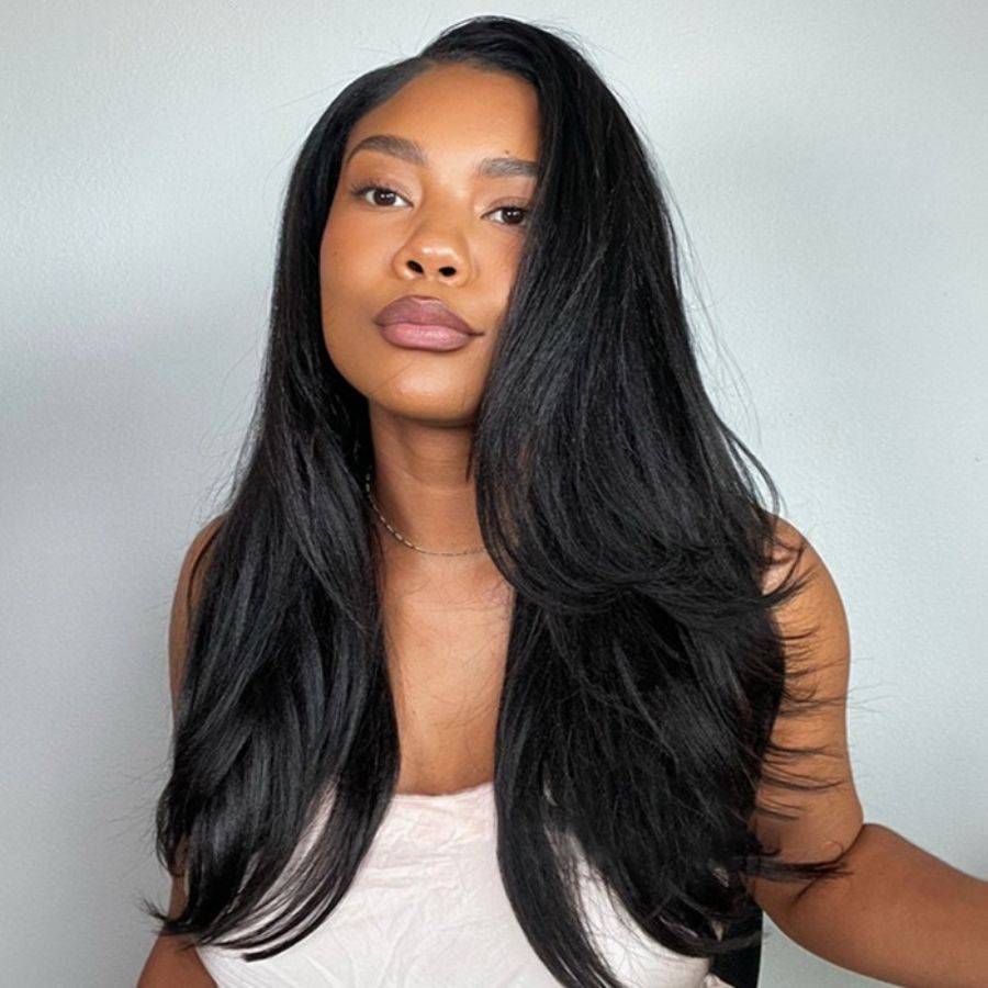 Beginner-friendly WOWANGEL Yaki Straight Half Wig worn by model, showcasing voluminous layers and natural black color.