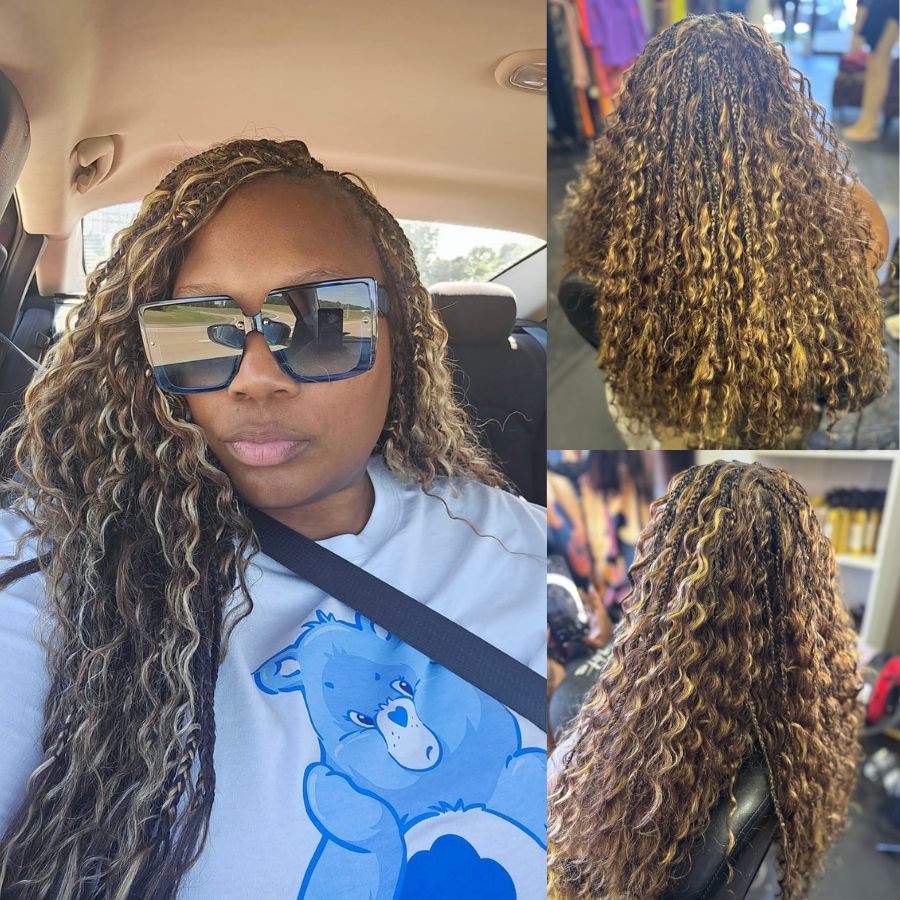 Woman with highlighted deep wave braids in a car.