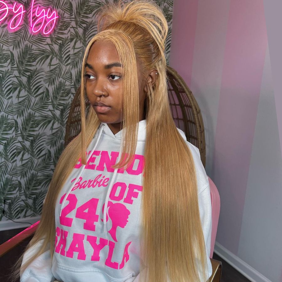 WOWANGEL Honey Blonde Lace Front Wig styled in a half-up look, showcasing its HD lace and natural blend with the scalp.