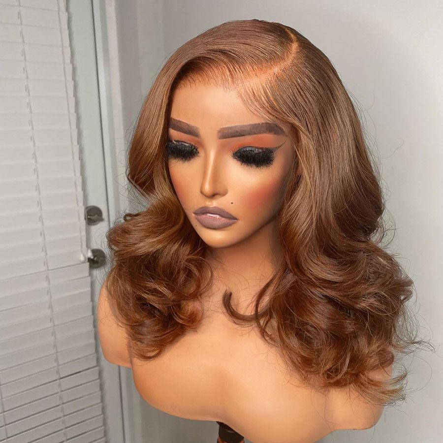 Side view of honey brown body wave wig on mannequin