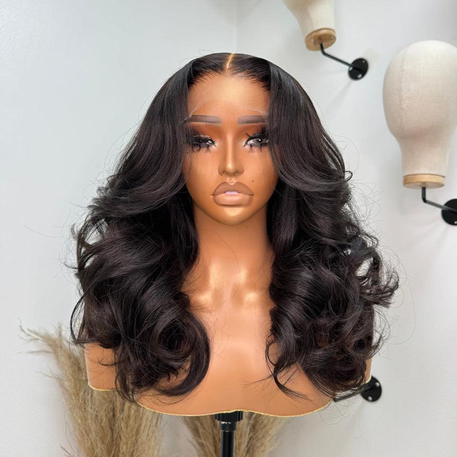 WOWANGEL 13x4 HD lace wig with body wave curls on mannequin