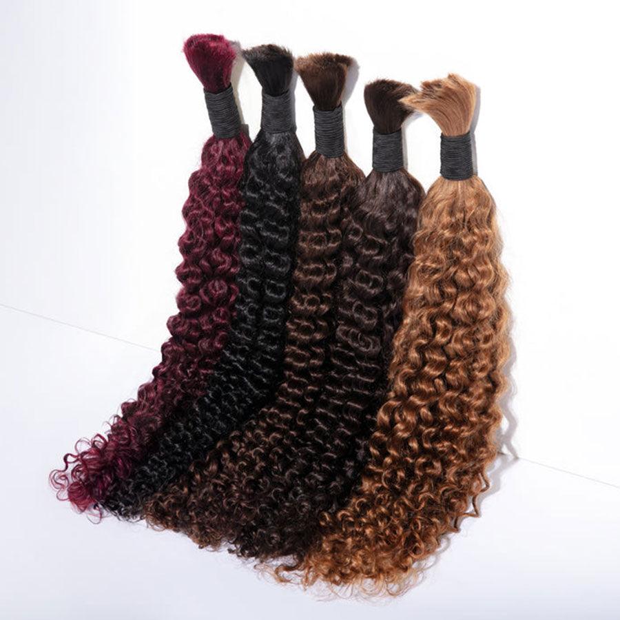 Curly human hair bundles in various colors for braiding.