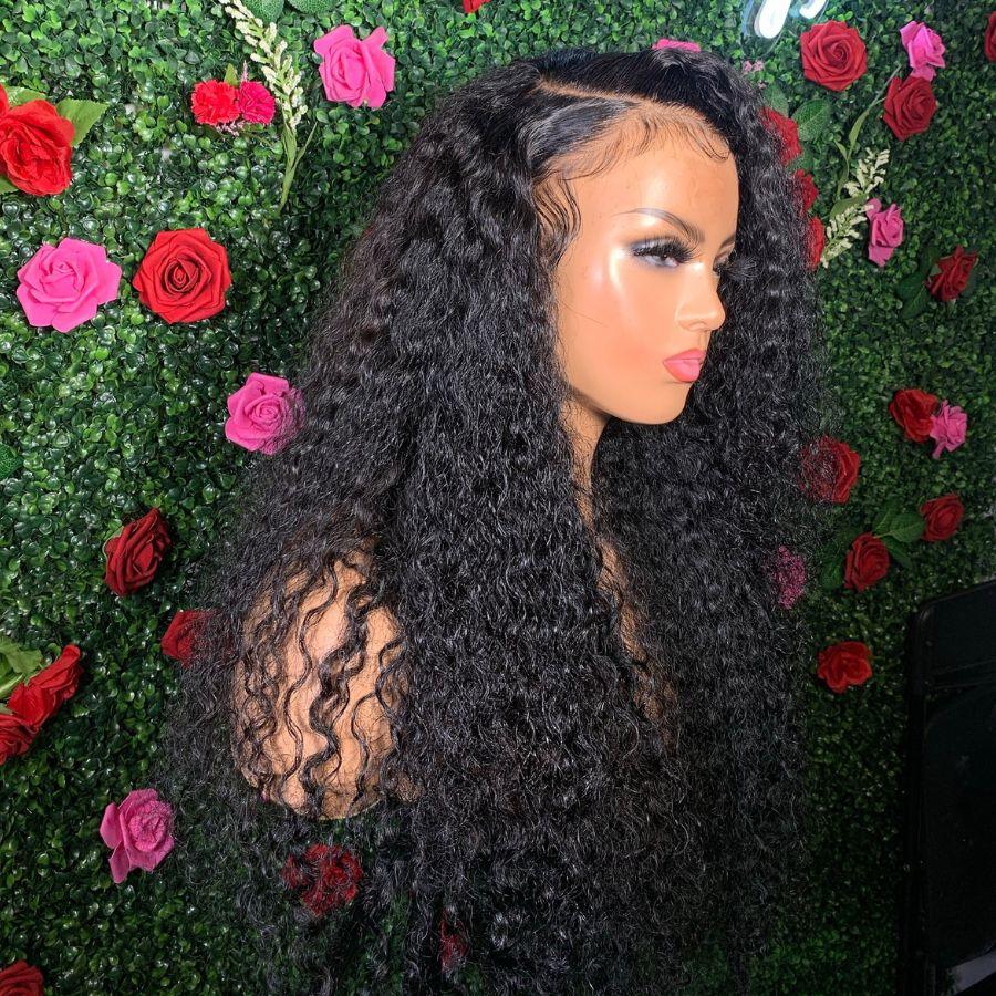 Curly HD lace wig on mannequin with floral backdrop